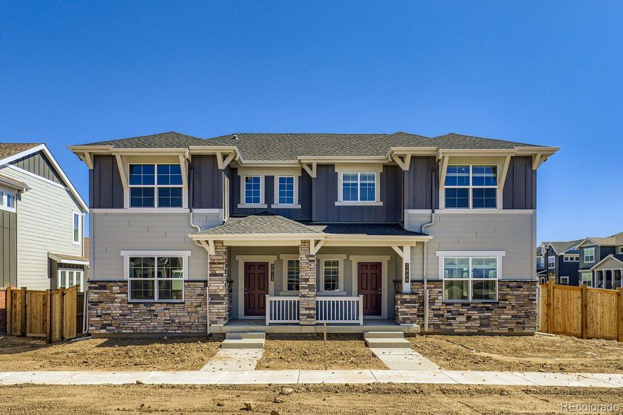 Front exterior of a new home in , Thornton, CO, highlighting curb appeal (Image 2).