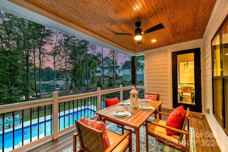 Covered Patio off Breakfast Area for relaxing, breath taking views of private pool/spa & Lake!