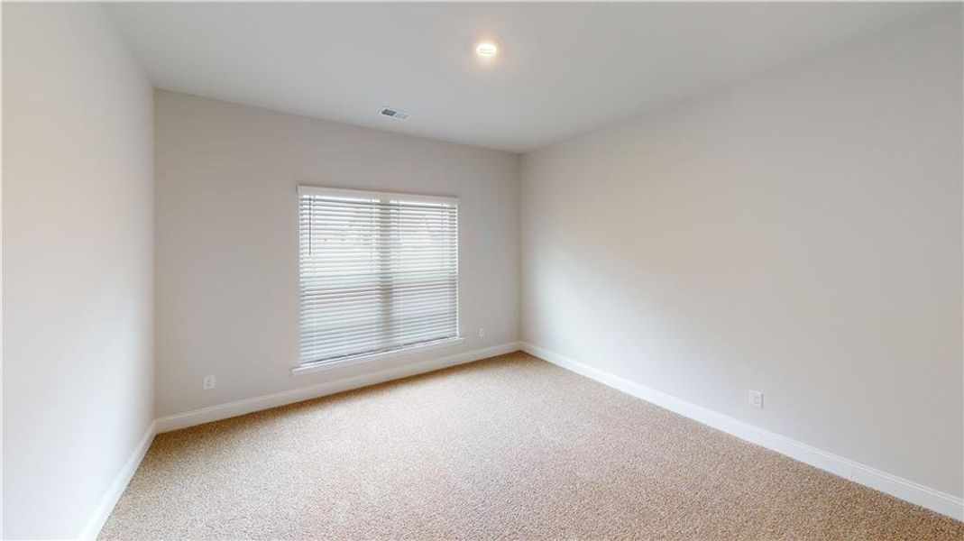 Spacious, unfurnished interior of a new home in Holliday Pass, Griffin (Image 28).