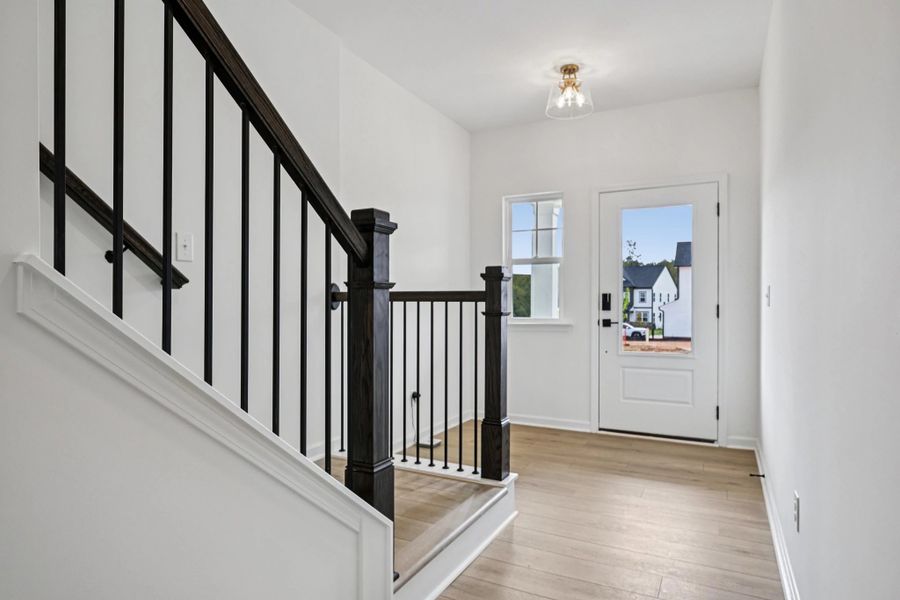 Foyer featuring the AW Collection® Sapphire - Bright white meets bold blue for a daring welcome. Foyer featuring the AW Collection® Sapphire - Bright white meets bold blue for a daring welcome.