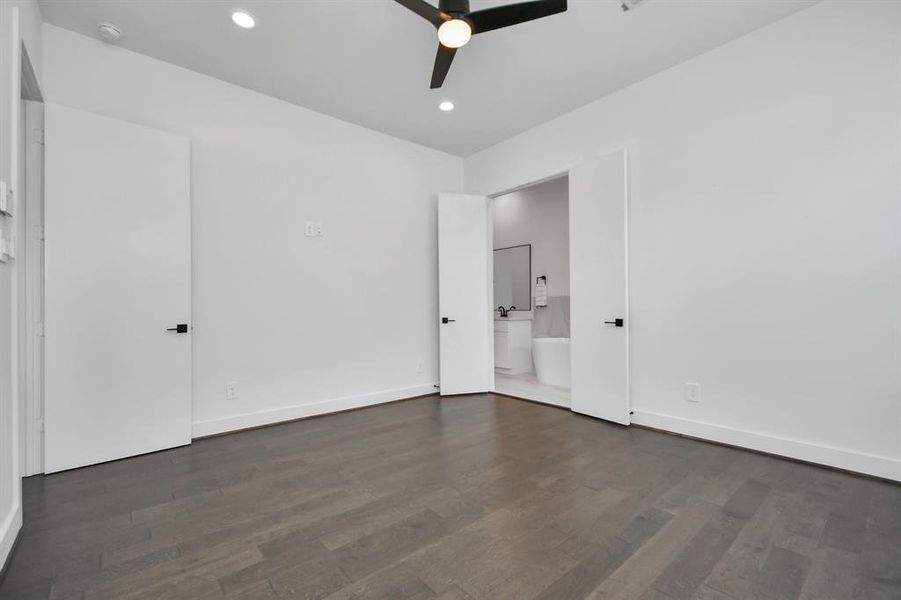 Enjoy the timeless elegance of hardwood flooring in your primary retreat, adding warmth and sophistication to the space