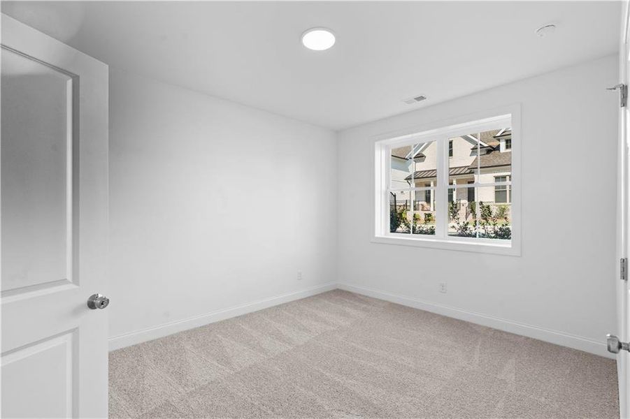 Spacious, unfurnished interior of a new home in Evanshire Townhomes, Duluth (Image 23).