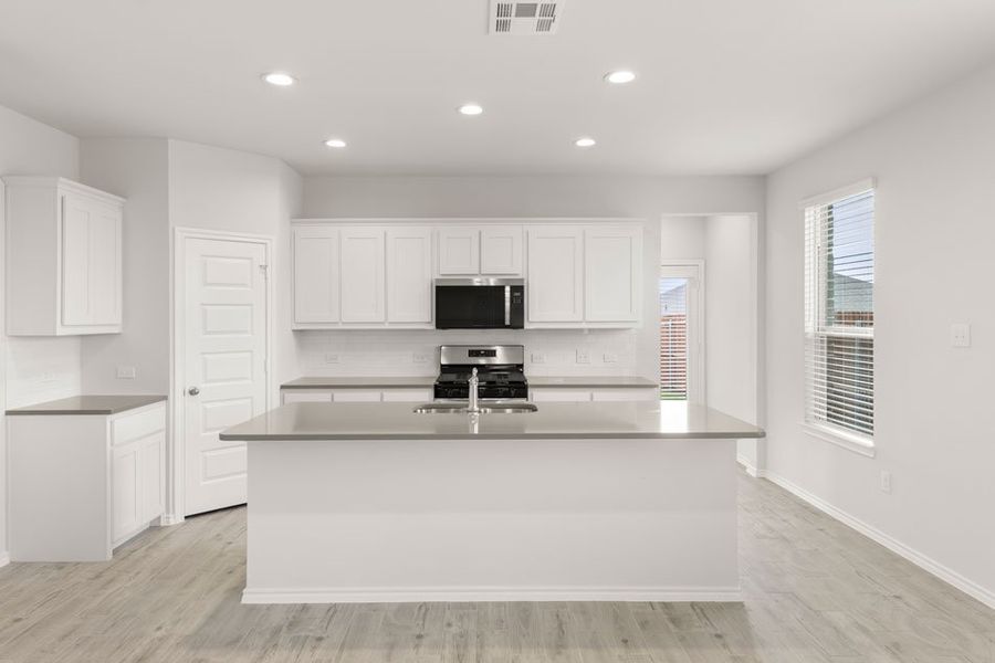 Front exterior of a new home in Northspur, Terrell, TX, highlighting curb appeal (Image 8). Front exterior of a new home in Northspur, Terrell, TX, highlighting curb appeal (Image 8).