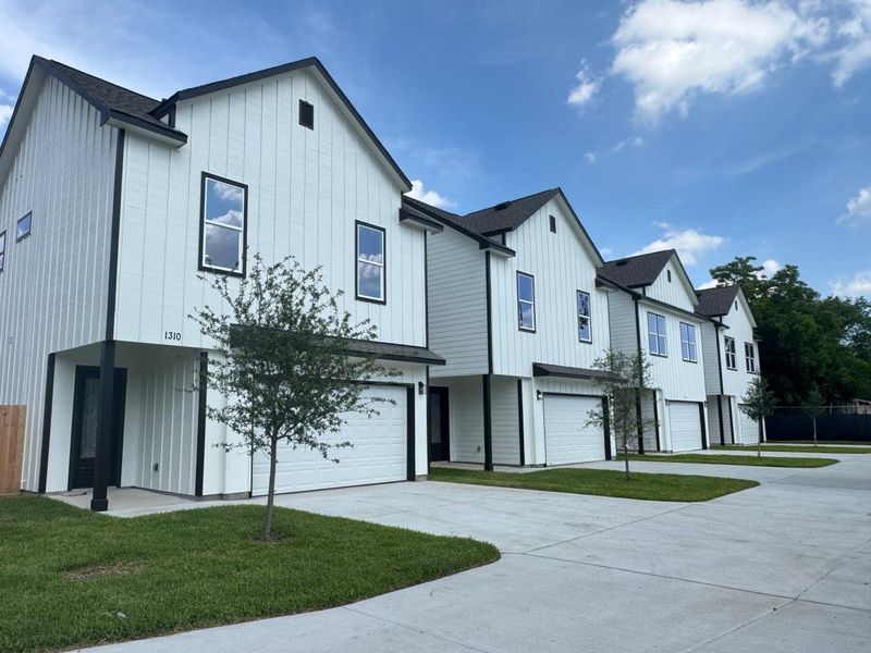 Front exterior of a new home in , Houston, TX, highlighting curb appeal (Image 21).