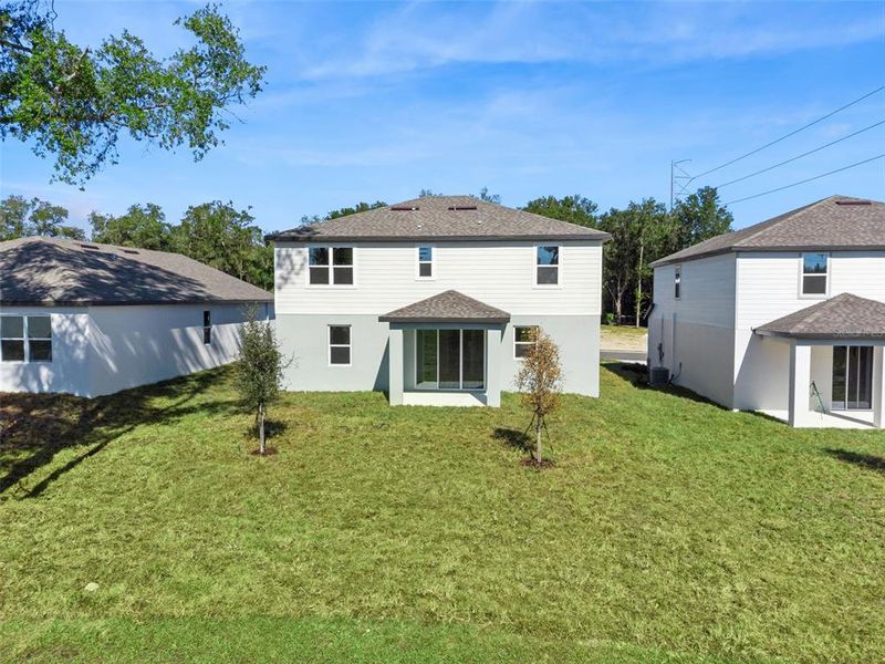 Exterior details and patio area of a home in Estes Reserve, Eustis (Image 13).