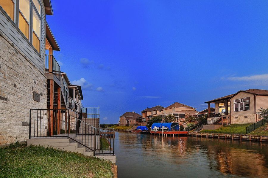 Exterior details and patio area of a home in Lake Breeze, Willis (Image 3).