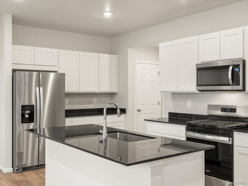 Furnished interior view inside a new home in Lake Bluff, Greeley (Image 7).