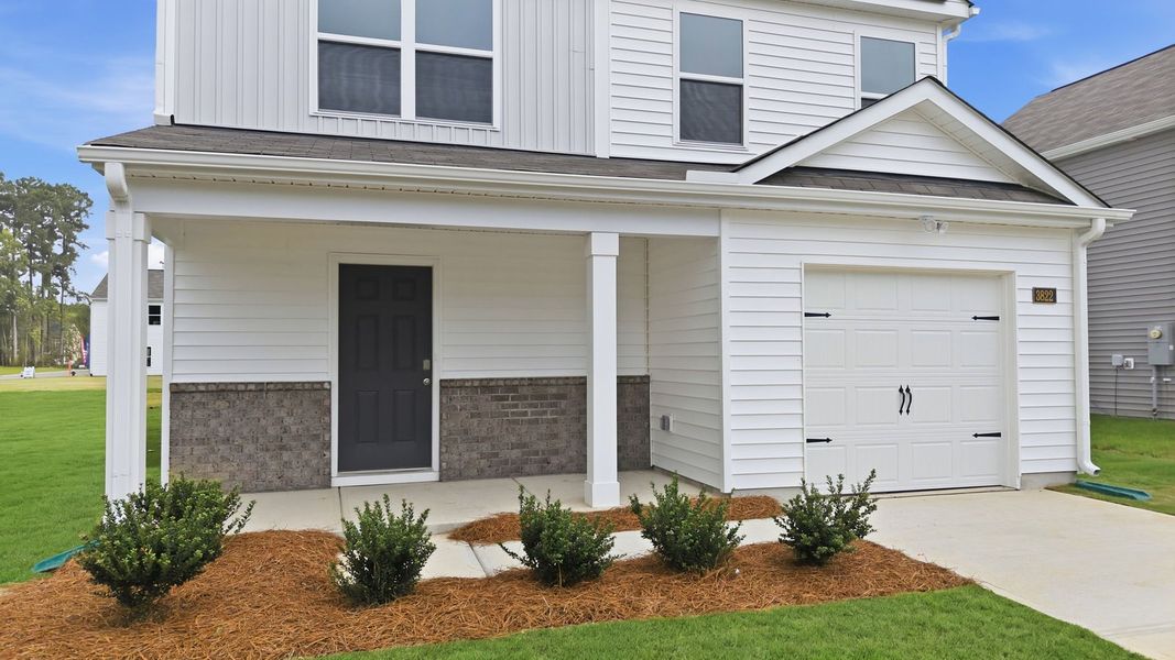 Front exterior of a new home in Jetstream Park, Wilson, NC, highlighting curb appeal (Image 21).