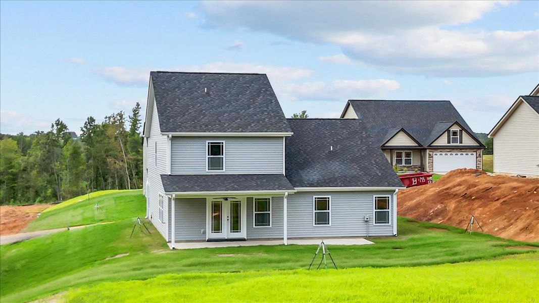 Representative exterior photo of a completed home built from the Ridge by Enchanted Homes in Ballentine Ridge, Lyman, SC (Image 18).