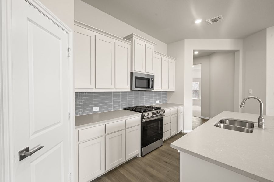 Furnished interior view inside a new home in Hunters Ridge, Crowley (Image 9).