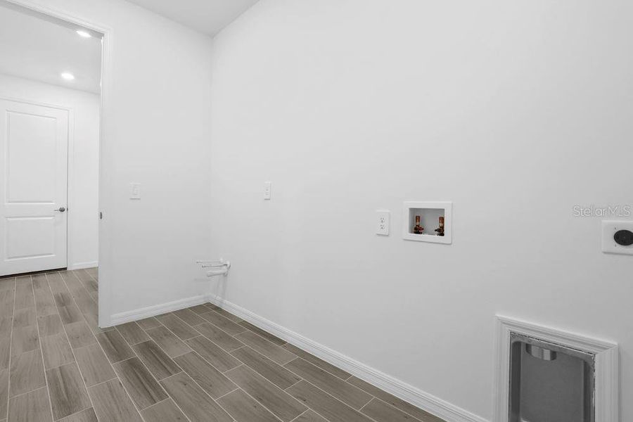 Spacious, unfurnished interior of a new home in The Cove at West Port, Port Charlotte (Image 21). Spacious, unfurnished interior of a new home in The Cove at West Port, Port Charlotte (Image 21).