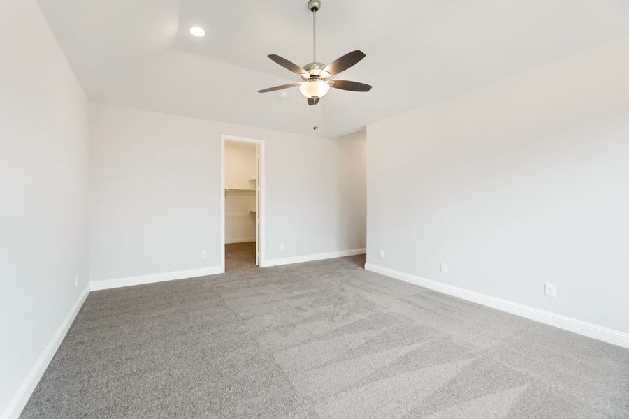 Representative unfurnished interior of a home built from the Bridgeport by UnionMain Homes in Lake Breeze, Lavon (Image 25).