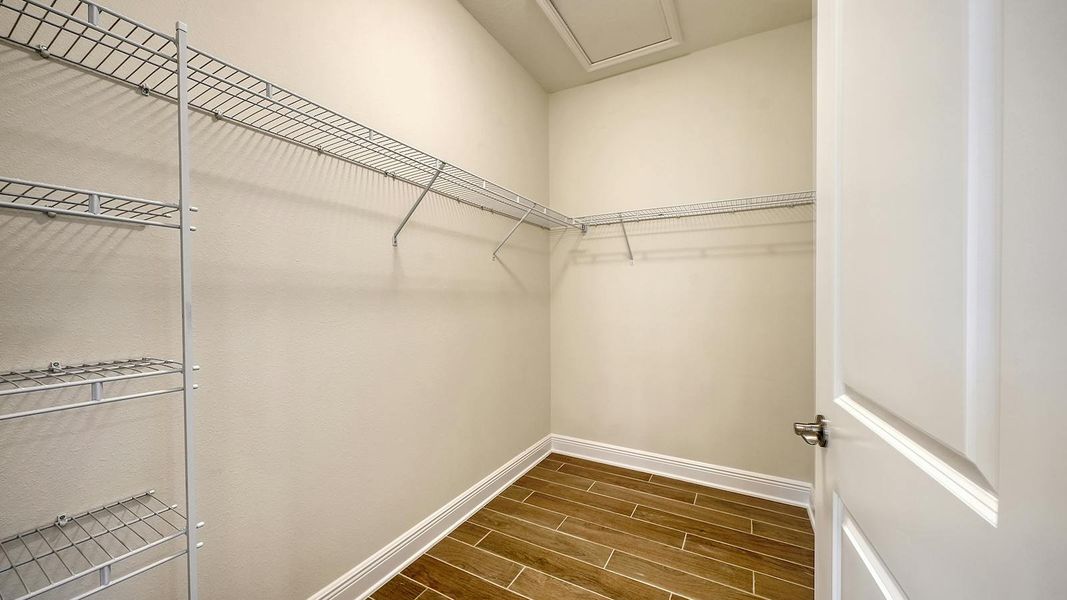 Spacious, unfurnished interior of a new home in Grand Park Real Estate and Homes for Sale in Sarasota, FL - Neal Communities, Sarasota (Image 36).