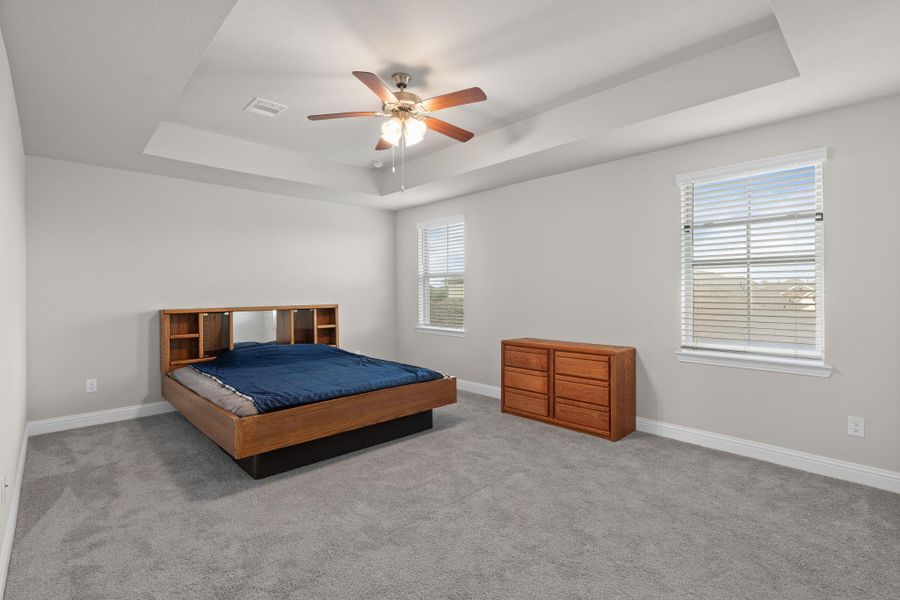Furnished interior view inside a new home in Sunterra, Katy (Image 13).