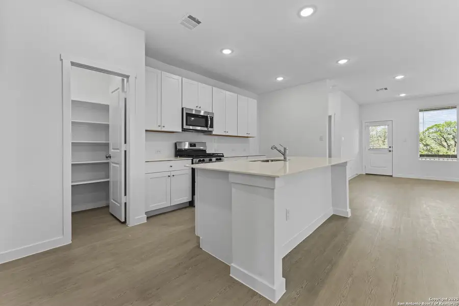Furnished interior view inside a new home in Waterwheel: Coastline Collection, San Antonio (Image 4).