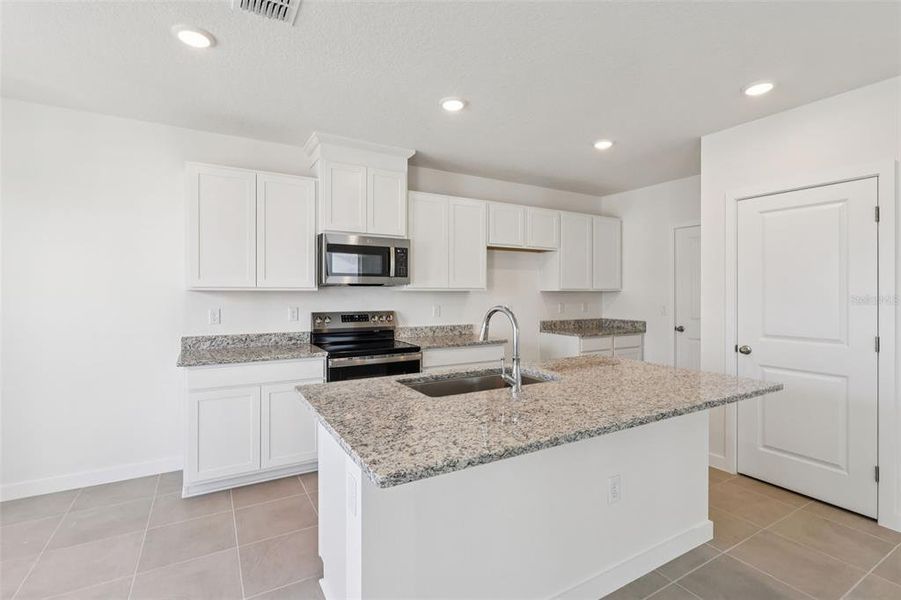 Furnished interior view inside a new home in Cyrene at Harmony, St. Cloud (Image 8).