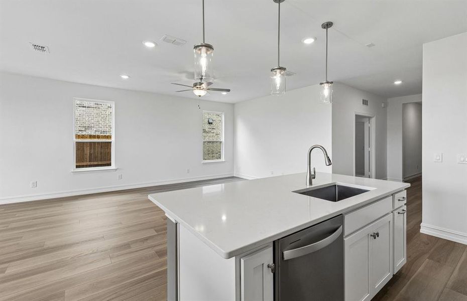 Kitchen with beautiful pendent lighting