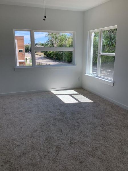 Unfurnished room featuring carpet flooring