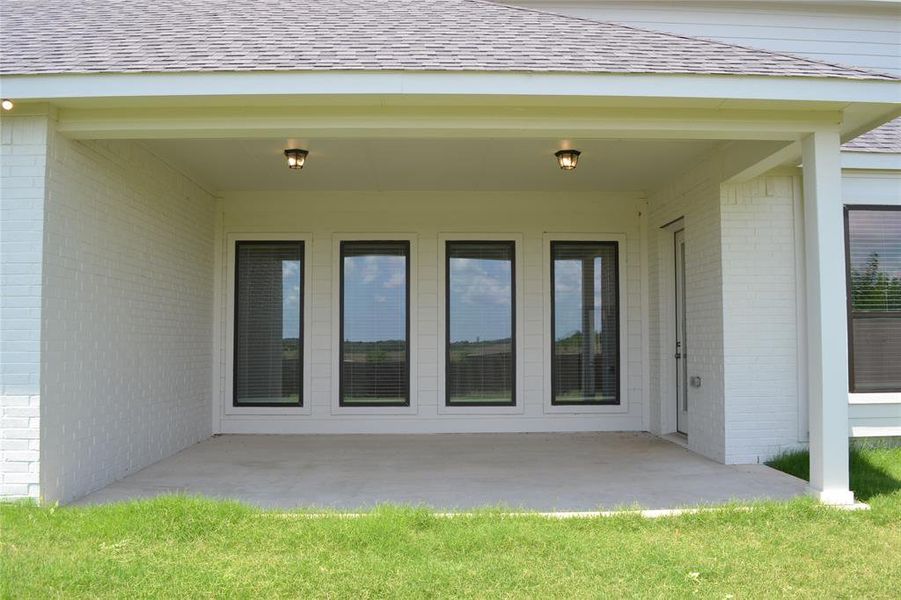 Exterior details and patio area of a home in Villages of Walnut Grove Phase 1, Midlothian (Image 3). Exterior details and patio area of a home in Villages of Walnut Grove Phase 1, Midlothian (Image 3).