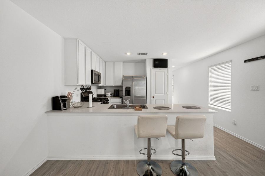Furnished interior view inside a new home in Elm Creek, Elgin (Image 28).