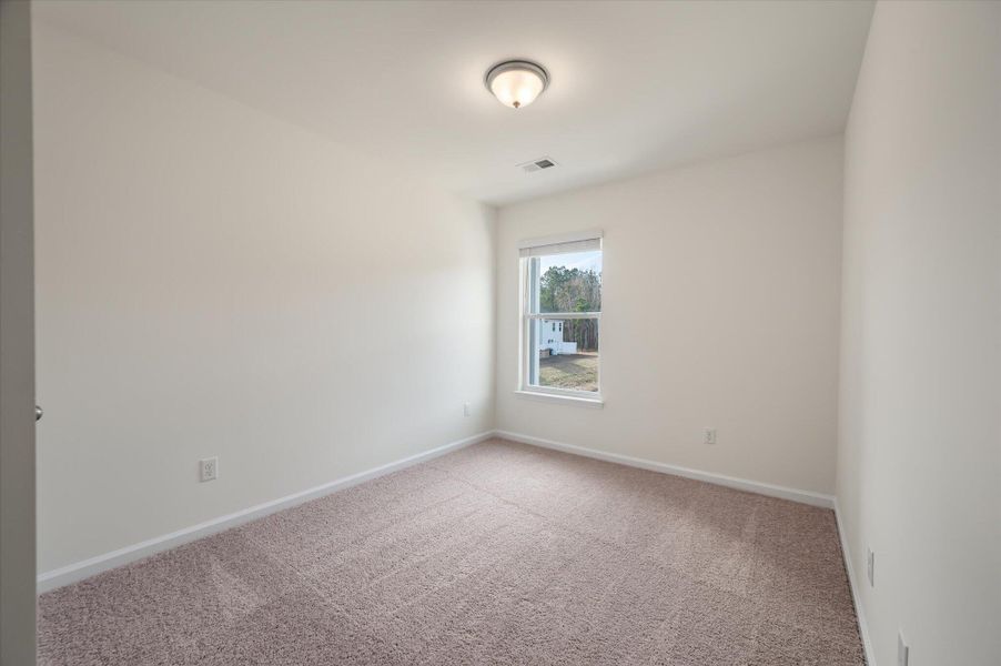Spacious, unfurnished interior of a new home in The Landings at Montague, Goose Creek (Image 27). Spacious, unfurnished interior of a new home in The Landings at Montague, Goose Creek (Image 27).