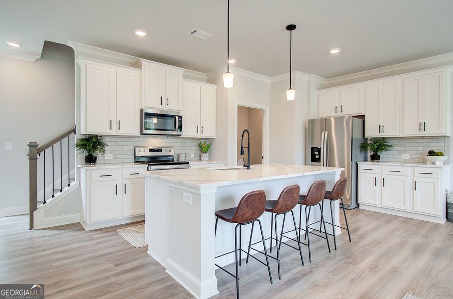 Furnished interior view inside a new home in Millstone at Mundy Mill, Gainesville (Image 5).