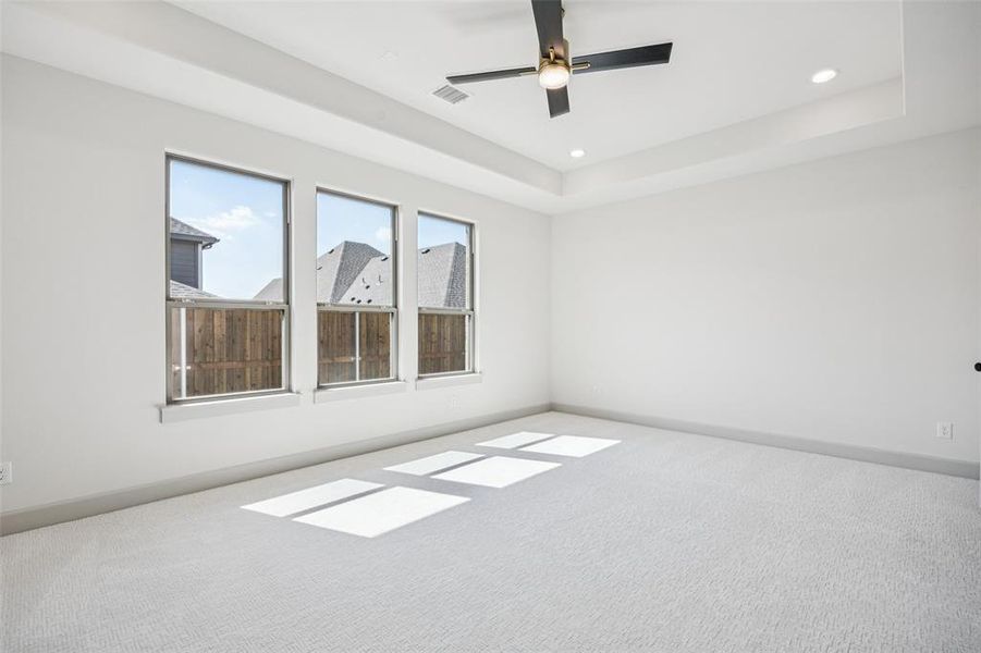 The peaceful owner's suite is located at the back of the home for additional privacy.