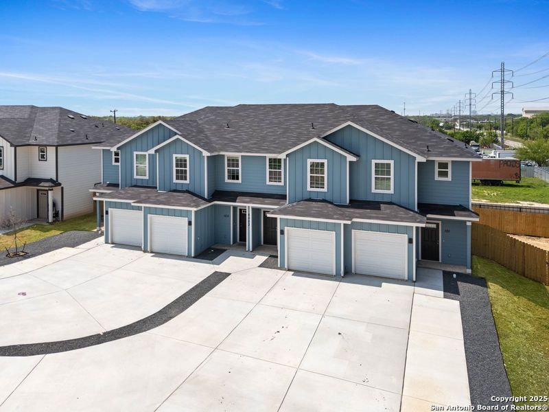 Front exterior of a new home in The Preserve at Candlemeadow, San Antonio, TX, highlighting curb appeal (Image 23).