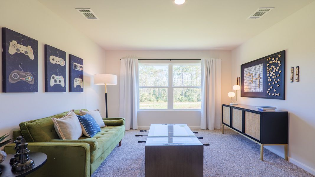 Representative furnished interior of a home built from the The Carol by D.R. Horton in Misting Springs, Crawfordville (Image 26).