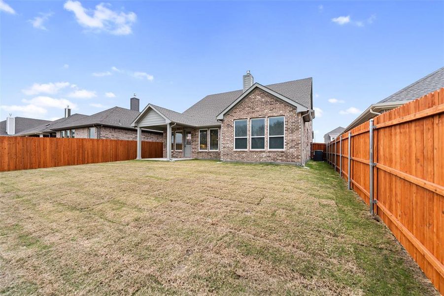 Exterior details and patio area of a home in Morningstar, Aledo (Image 27).