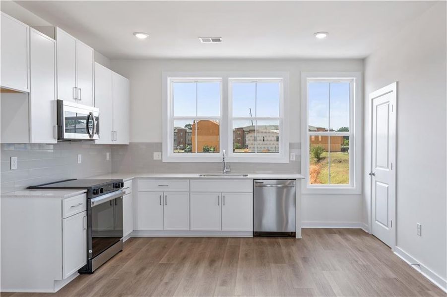 Furnished interior view inside a new home in Array, Atlanta (Image 7).