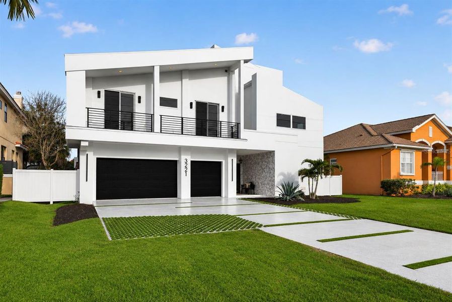 Front exterior of a new home in , Belleair Beach, FL, highlighting curb appeal (Image 31).