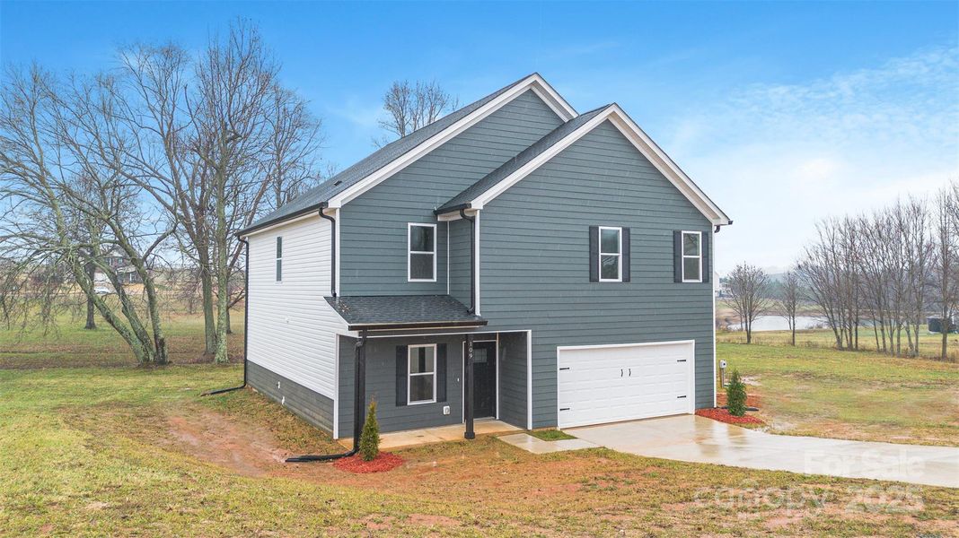 Front exterior of a new home in , Shelby, NC, highlighting curb appeal (Image 21).