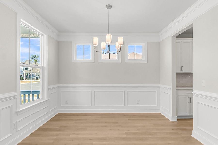 Spacious, unfurnished interior of a new home in Tidewater at Lakes of Cane Bay, Summerville (Image 30).