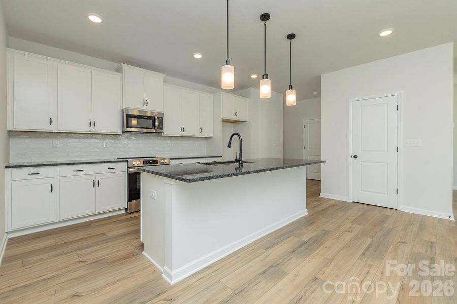 Furnished interior view inside a new home in Sunset Meadows, Charlotte (Image 4).