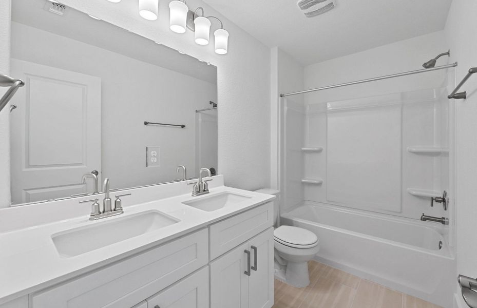 Furnished interior view inside a new home in Crosswinds, Kyle (Image 6).