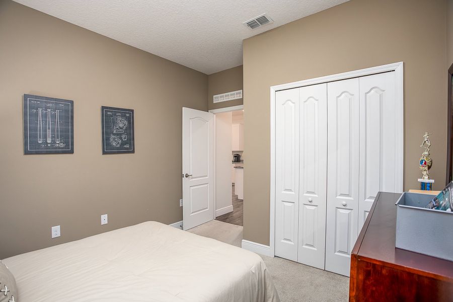 Furnished interior view inside a new home in Vero Lake Estates, Vero Beach (Image 13).