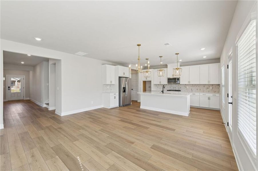Spacious, unfurnished interior of a new home in Vines at Mill Creek - Estate Series, Braselton (Image 49).
