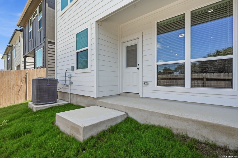 Exterior details and patio area of a home in Rose Hill, San Antonio (Image 27).