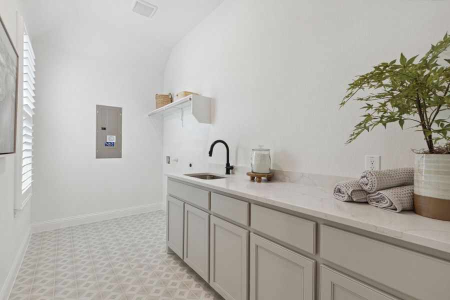 Laundry Room | Concept 3441 at Hidden Creek Estates in Van Alstyne, TX by Landsea Homes