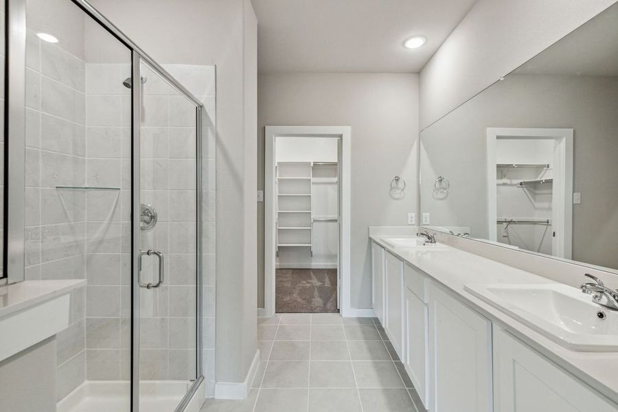 Primary Bathroom in the Mesquite home plan by Trophy Signature Homes – REPRESENTATIVE PHOTO