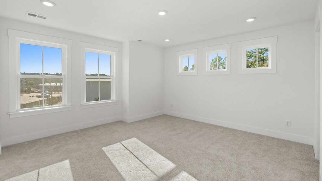 Furnished interior view inside a new home in Seabreeze Crossing, Little River (Image 12).