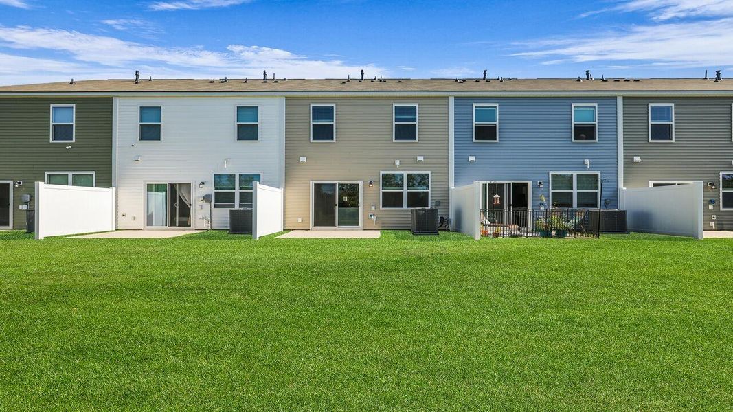 Exterior details and patio area of a home in Carolina Groves Townhomes, Moncks Corner (Image 20).