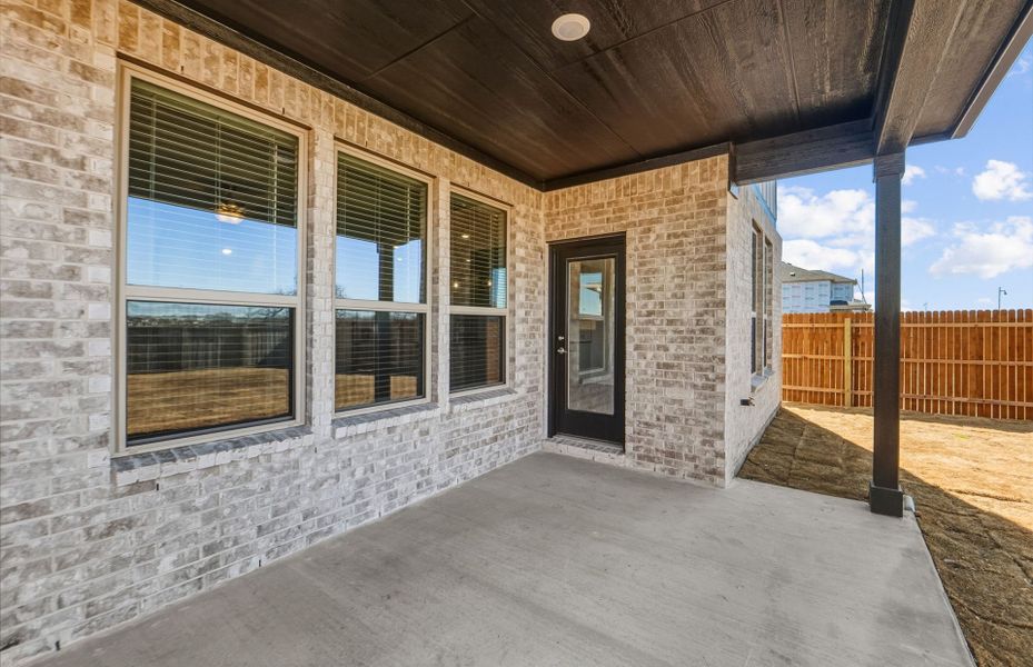 Exterior details and patio area of a home in Santa Rita Ranch, Liberty Hill (Image 29).