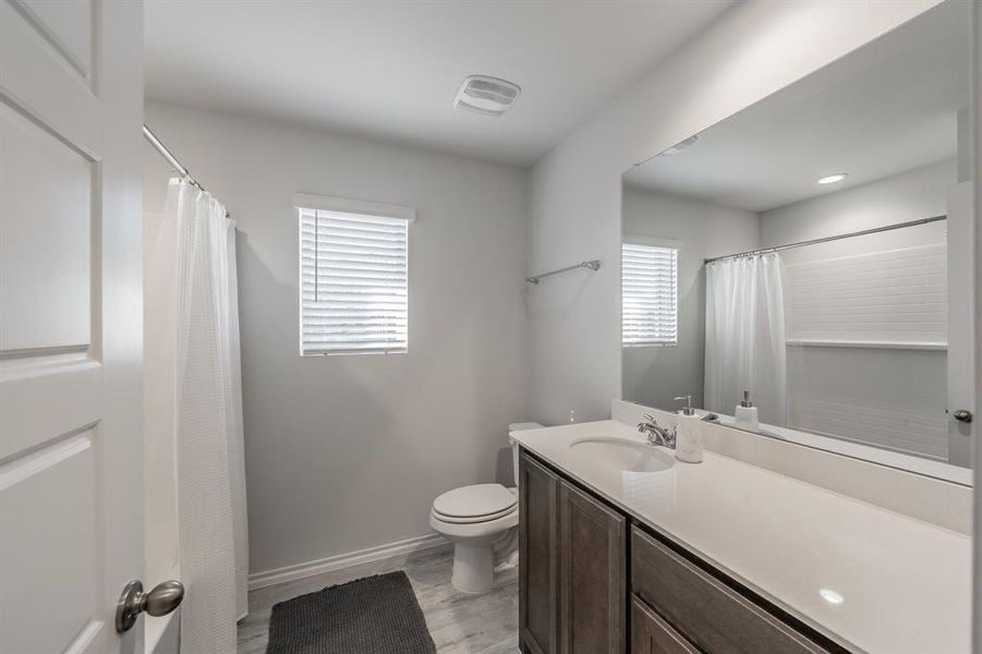 Furnished interior view inside a new home in Stone Eagle, Azle (Image 38).