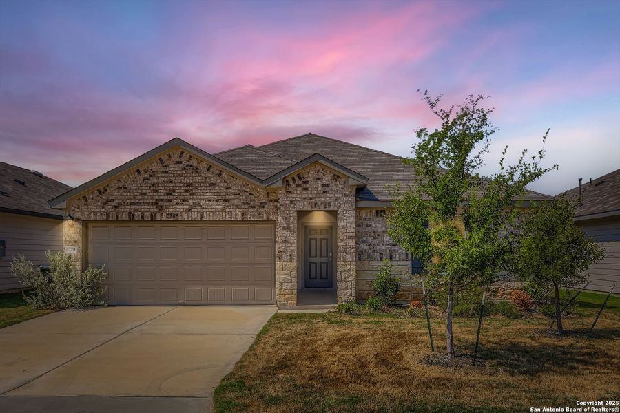 Front exterior of a new home in , New Braunfels, TX, highlighting curb appeal (Image 1). Front exterior of a new home in , New Braunfels, TX, highlighting curb appeal (Image 1).