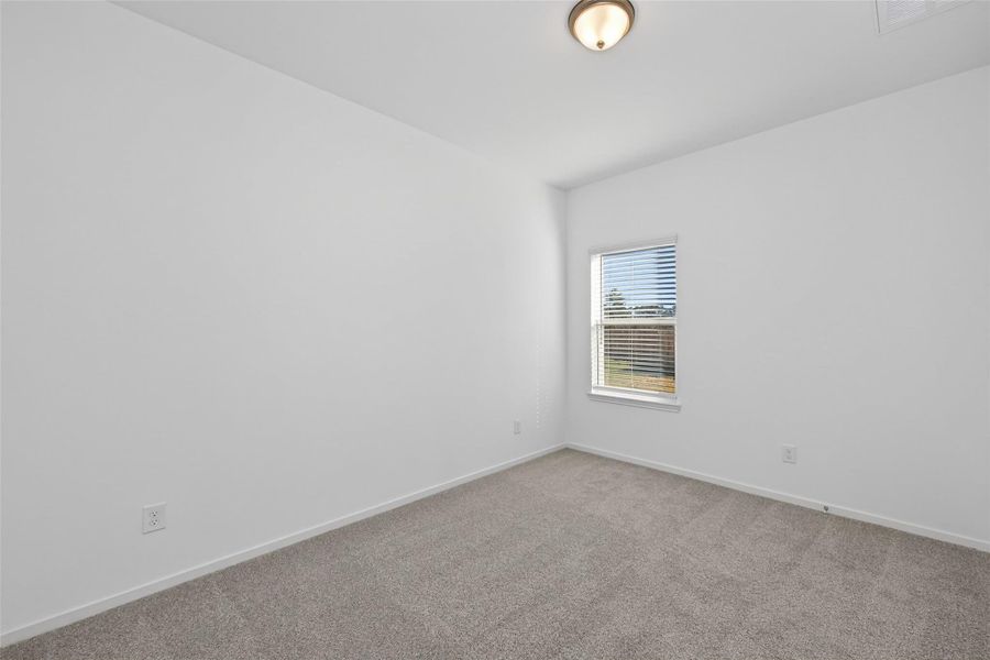 Spacious, unfurnished interior of a new home in Enclave at Willis, Willis (Image 15).