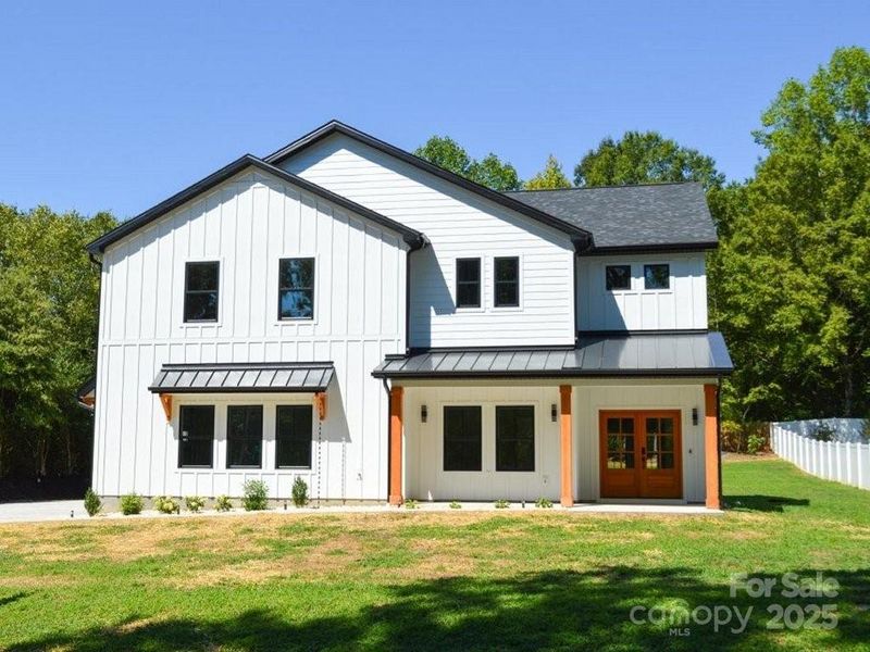 Front exterior of a new home in , Davidson, NC, highlighting curb appeal (Image 24).