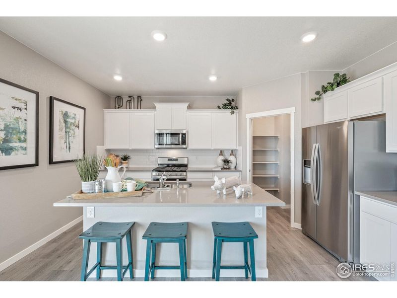Furnished interior view inside a new home in Fossil Creek Ranch, Windsor (Image 12).