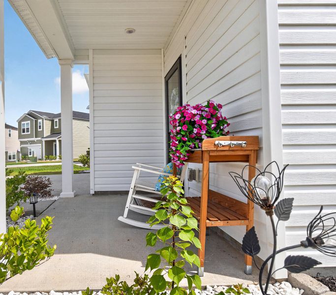 Exterior details and patio area of a home in Lindera Preserve at Cane Bay Plantation, Summerville (Image 25).